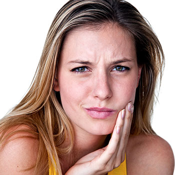 A blond woman with toothache 